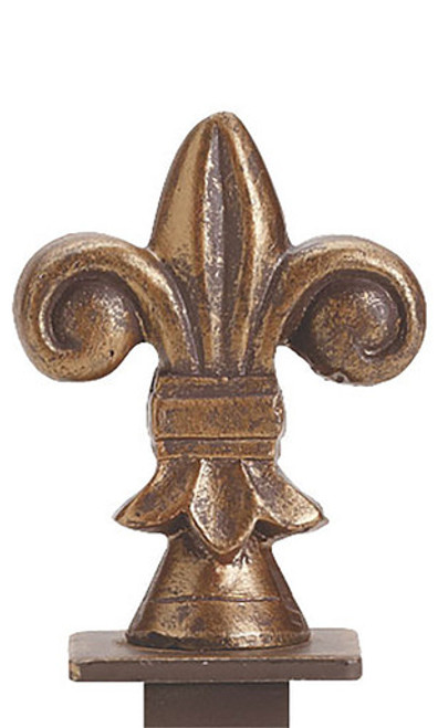 An image of the fleur de lis finial in cobblestone